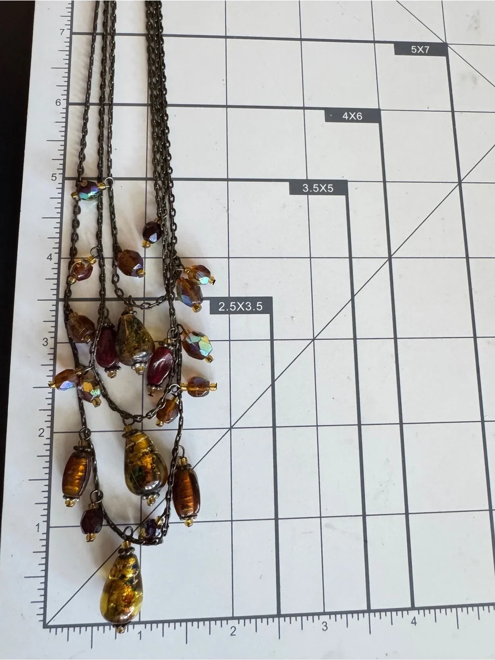 Multi-Layered Gold Tone Necklace with Iridescent Amber and Pink‎ Glass Drops